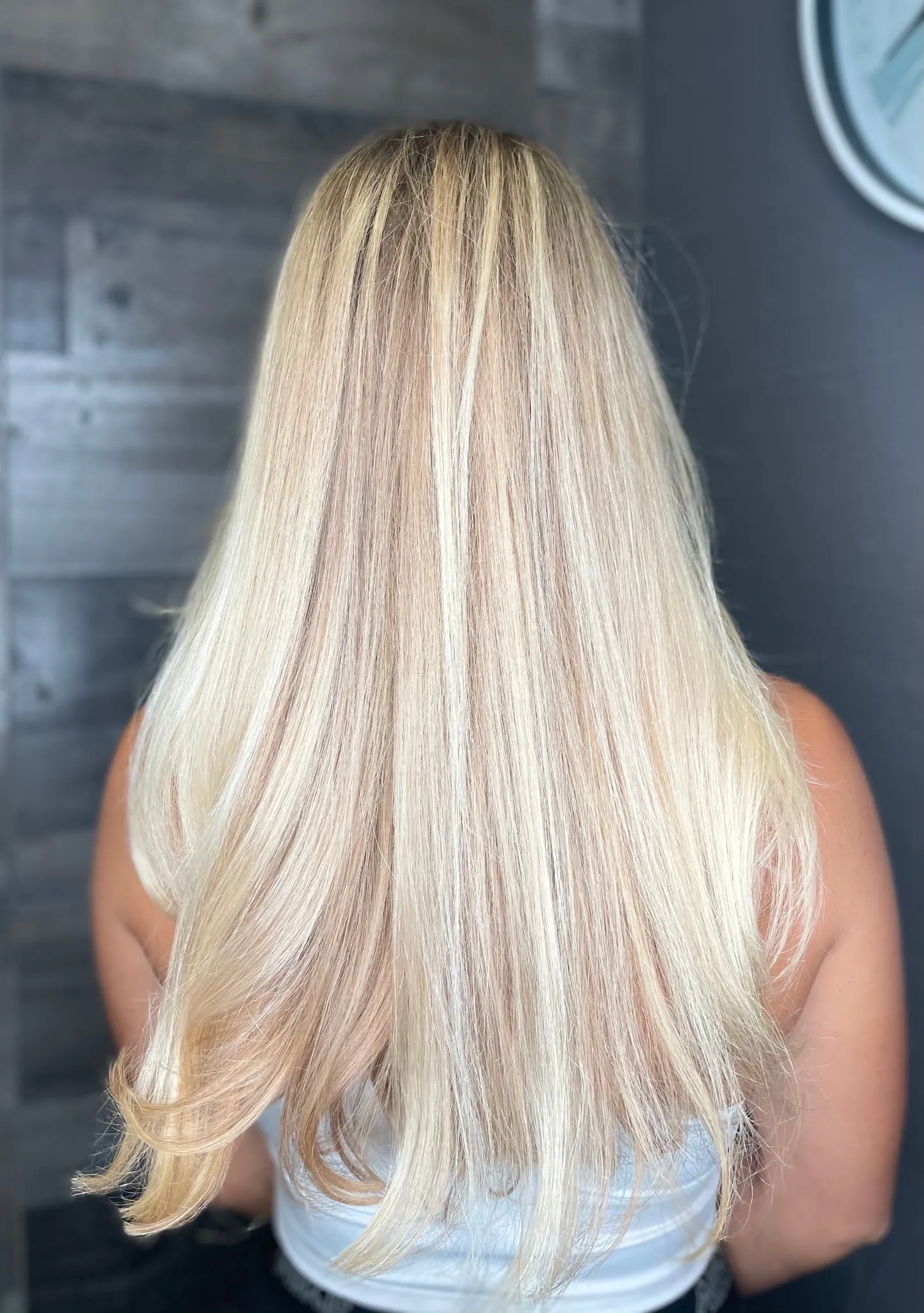 Smooth blonde balayage from back view